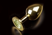 Анальные игрушки - большая золотистая анальная пробка с кристаллом фото