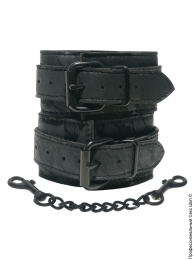 Фото силіконові наручники doc johnson the cuffs large - black в профессиональном Секс Шопе