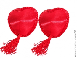 Фото прикраси на соски у формі сердечок в профессиональном Секс Шопе