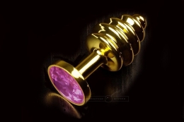 Фото витая золотистая анальная пробка с кристаллом в профессиональном Секс Шопе